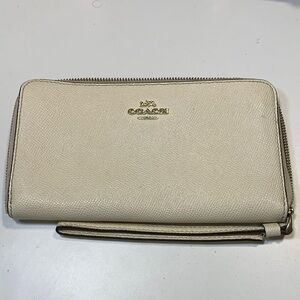 Coach Ivory Wristlet with Gold Accents